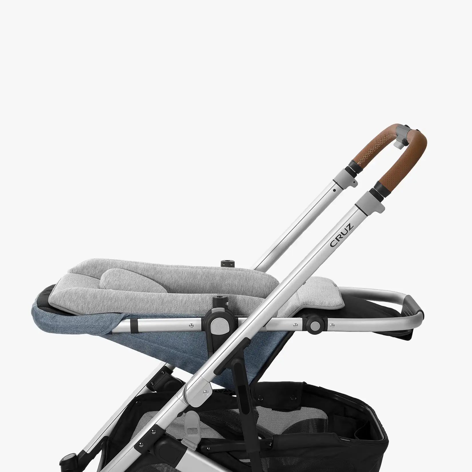 Shaped chair attached to baby stroller