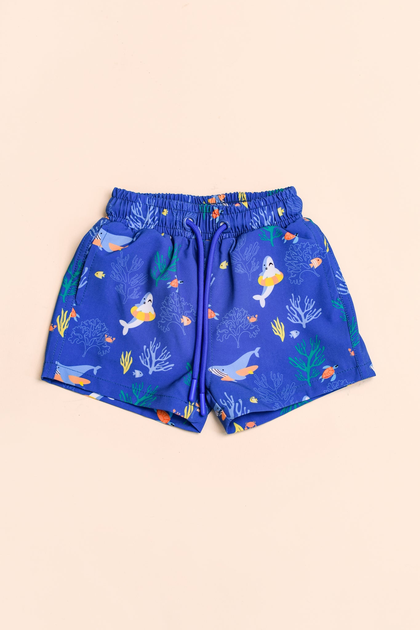 Tropical Coral swim trunks