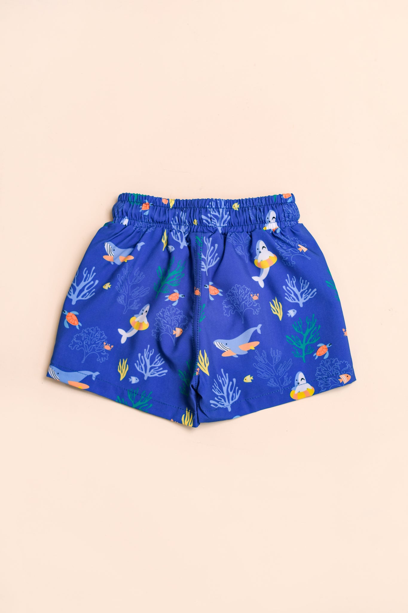 Tropical Coral swim trunks